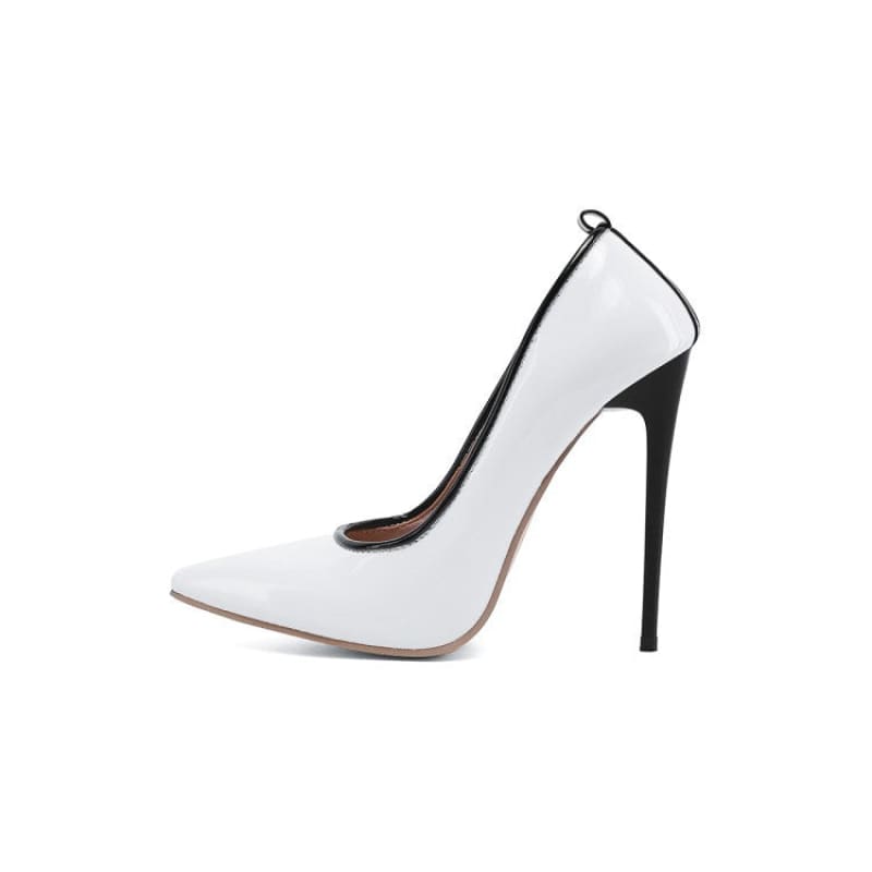 White high-heeled pump with a black stiletto heel and pointed toe.